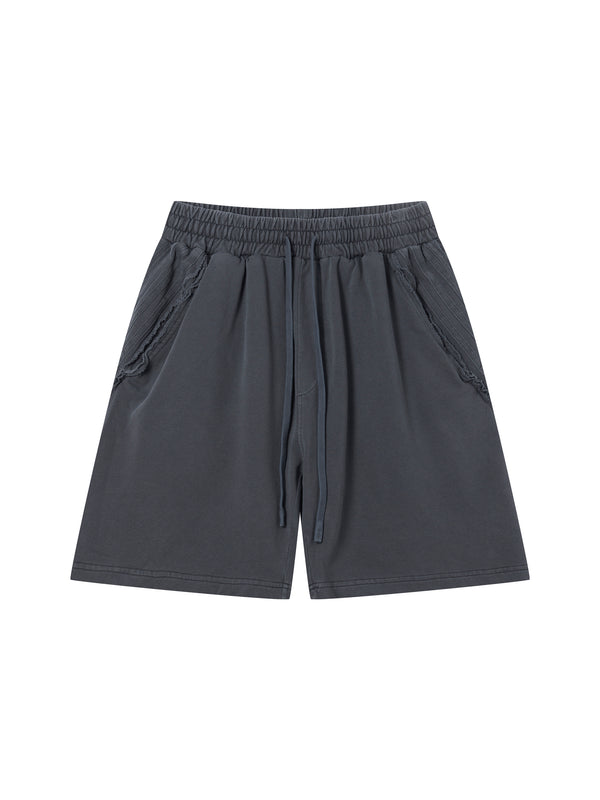Unisex Vintage Wash Raw Edge Shorts featuring a premium vintage wash finish, raw edge hem, oversized relaxed fit, breathable fabric, and modern U.S. streetwear styling by MYN2O.